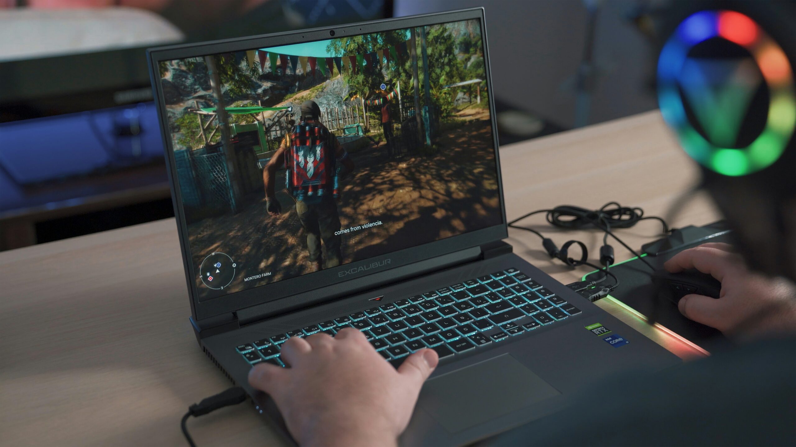 a-person-playing-a-video-game-on-a-laptop-scaled-1 Top 5 Gaming Laptops Under $2,000